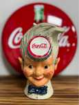 Boneco coca-cola