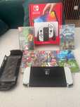 Nintendo Switch Oled kompletny zestaw + 5 gier i dodatki
