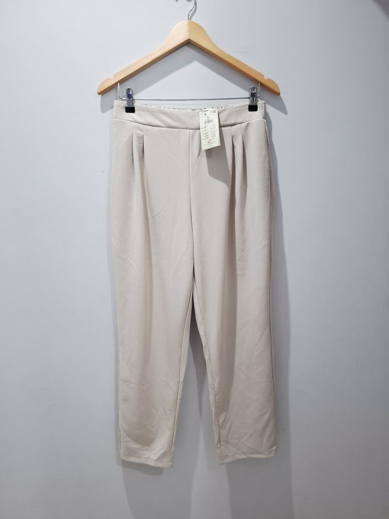Nowe beżowe spodnie casual reserved l 40