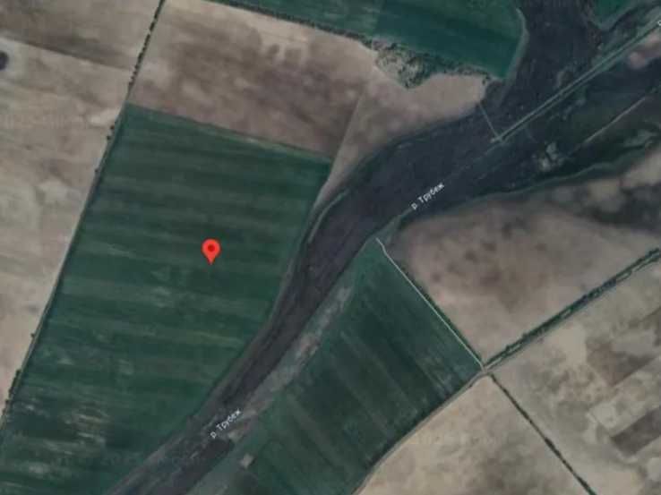 1/2 частка в праві власності на земельну ділянку площею 2.0583 га