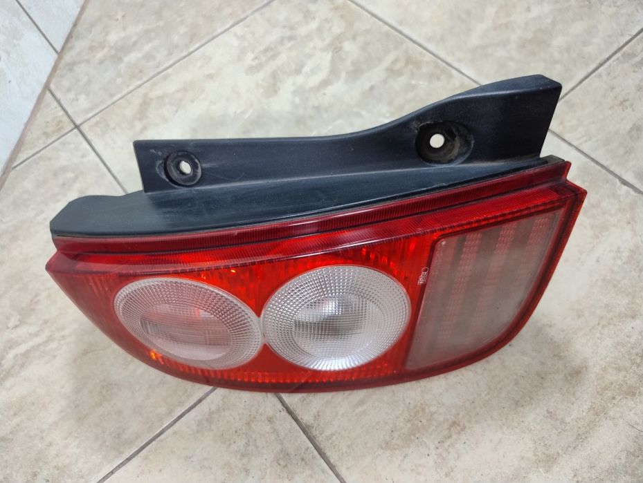 Nissan Micra k12 03-10 lampa lewy tył Europa oryginał wysyłka OLX