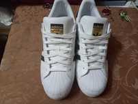 Sapatilhas adidas como novas
