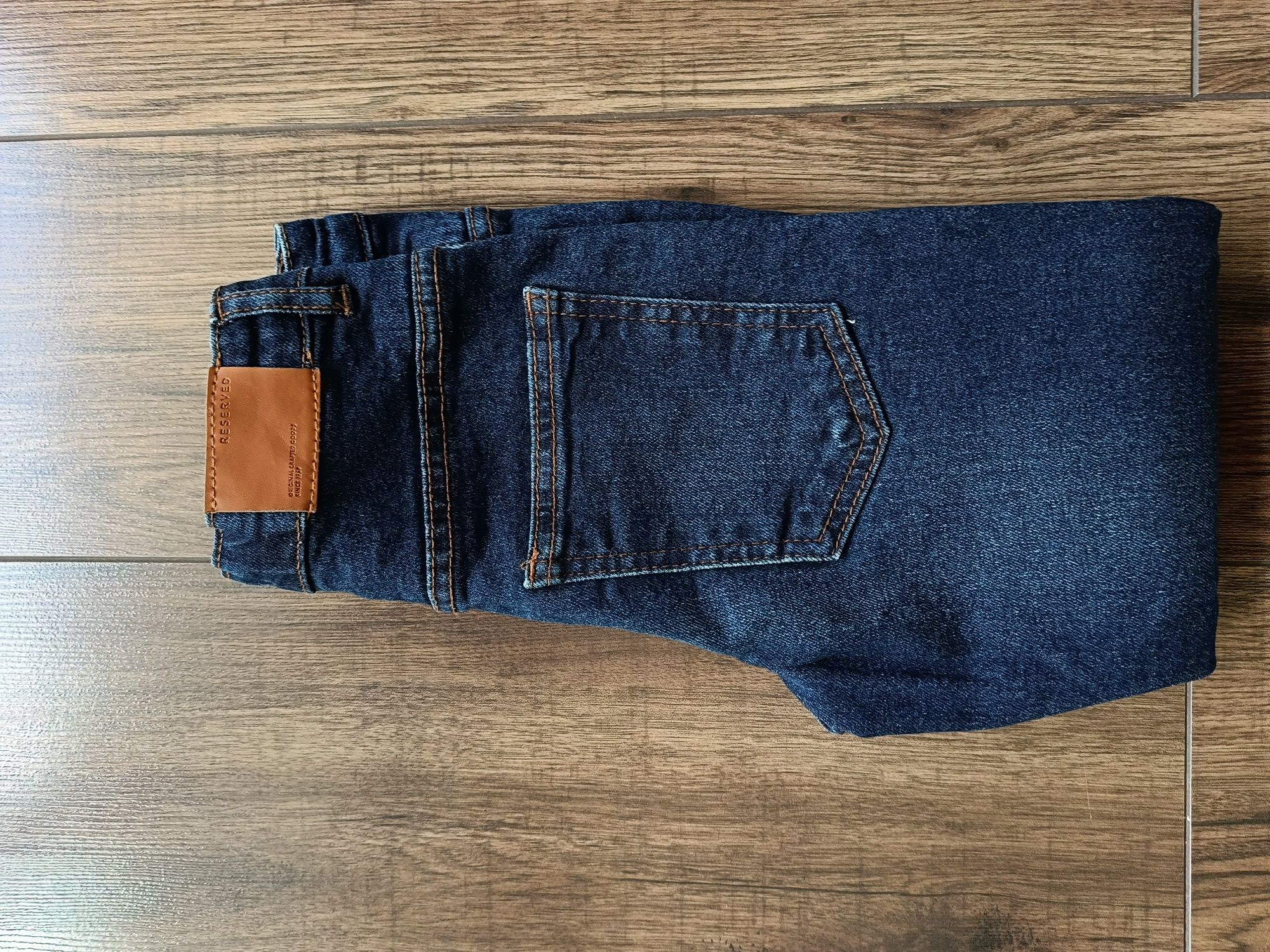 Spodnie jeansowe Reserved roz. 128