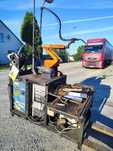 Robot spawalniczy ze stanowiskiem pracy