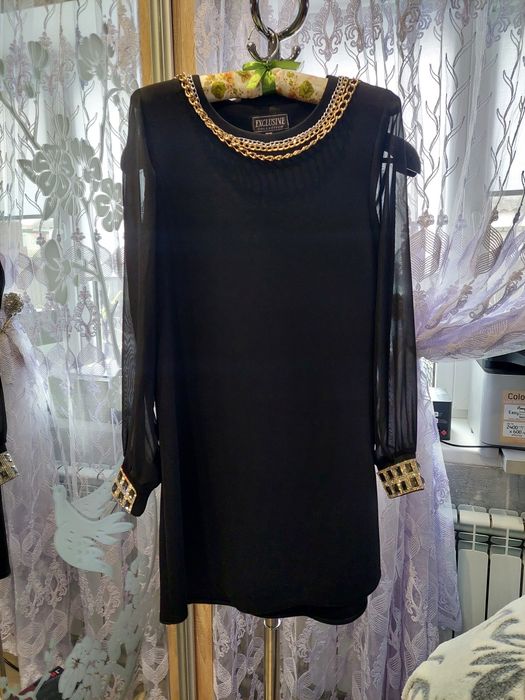 Сукні, плаття. Нові та б/у