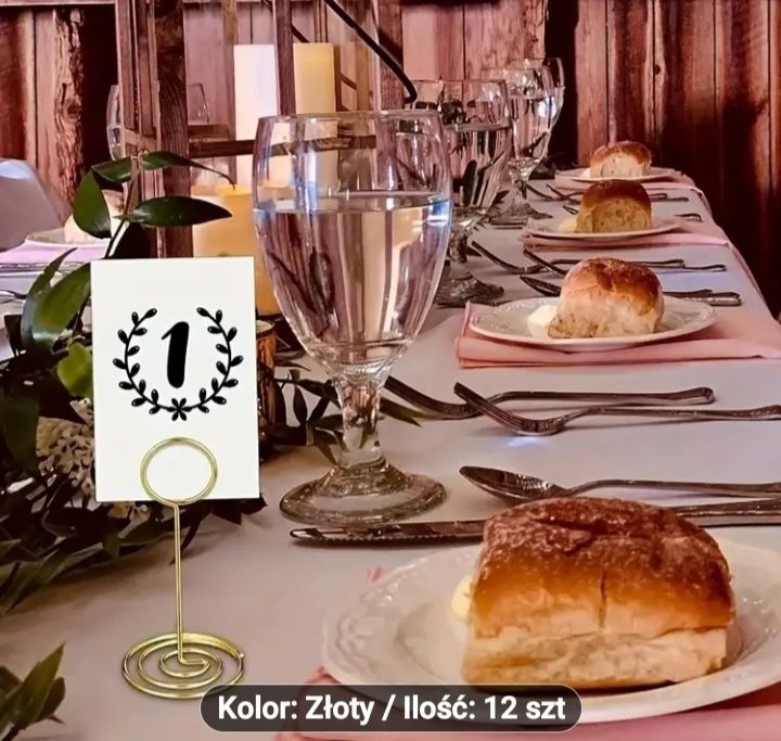 Metalowe uchwyty na numery stołów