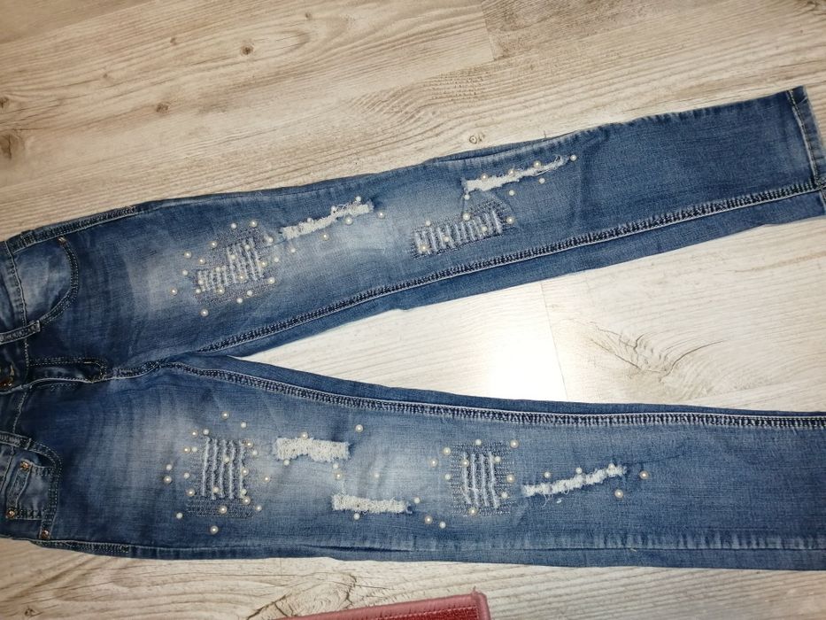 Spodnie dżinsy 146