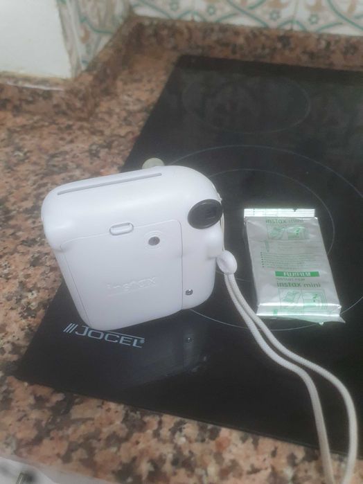 Camara instax mini 12 fujifilm +10fotos recargas selado