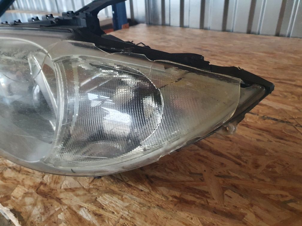 Lampa lewa xenon bmw e87 e81 bixenon Europa uszkodzona