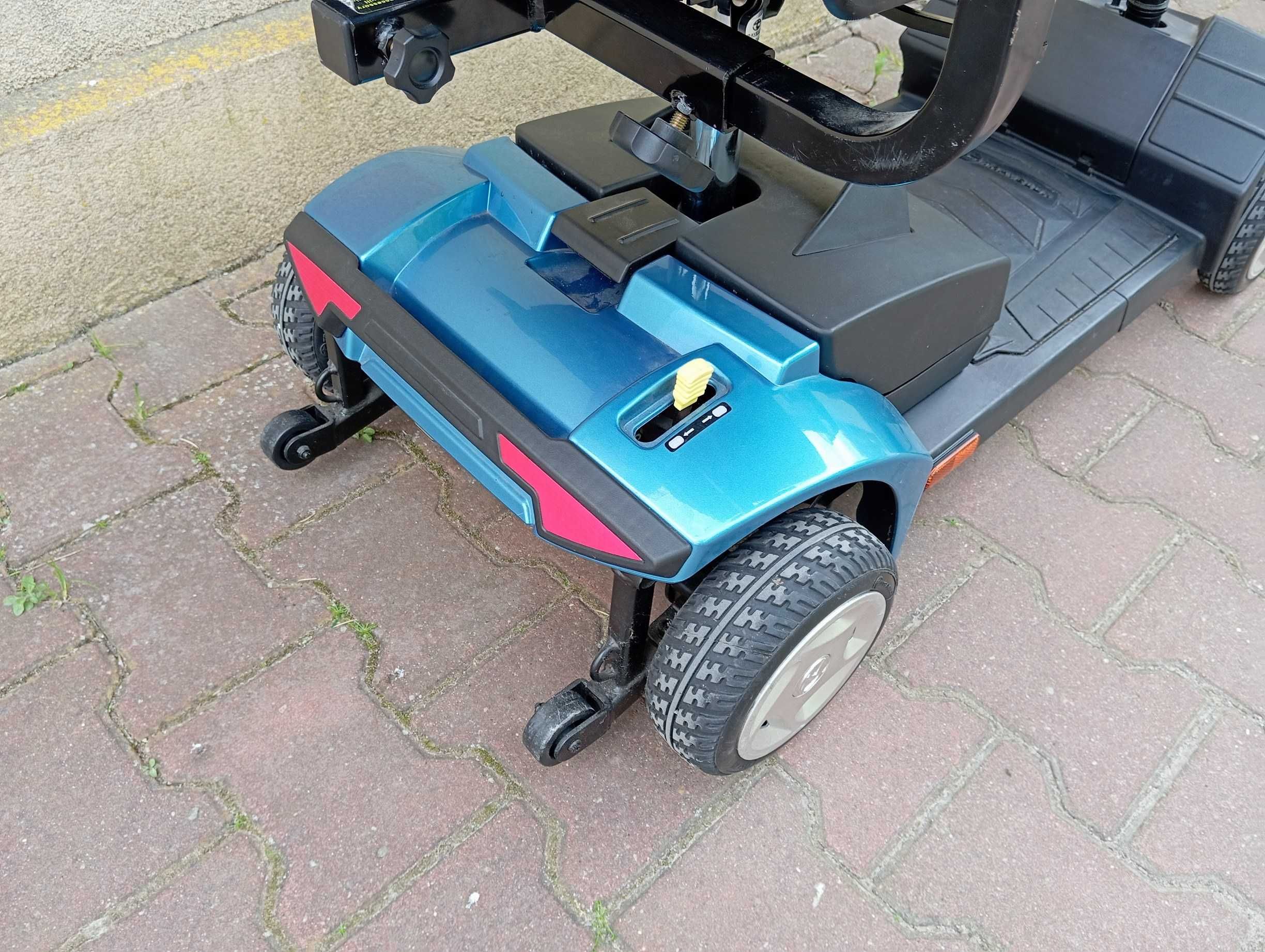 Wózek elektryczny skuter dla seniora Travelux składany nowe baterie
