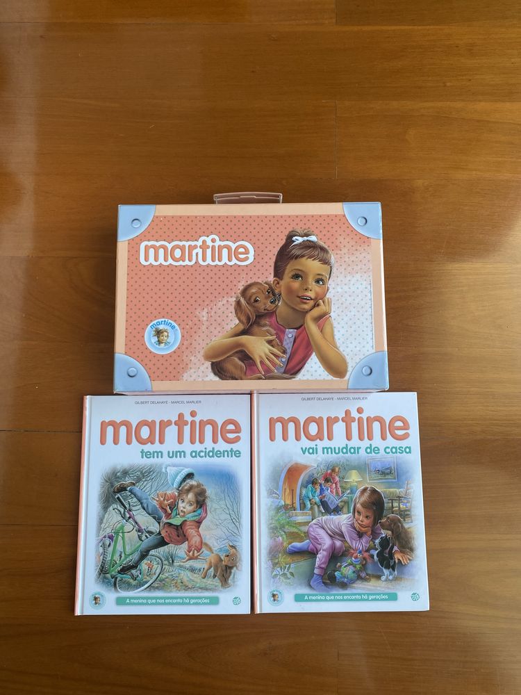 Livros e mala martine- martine vai mudar de casa, tem um acidente