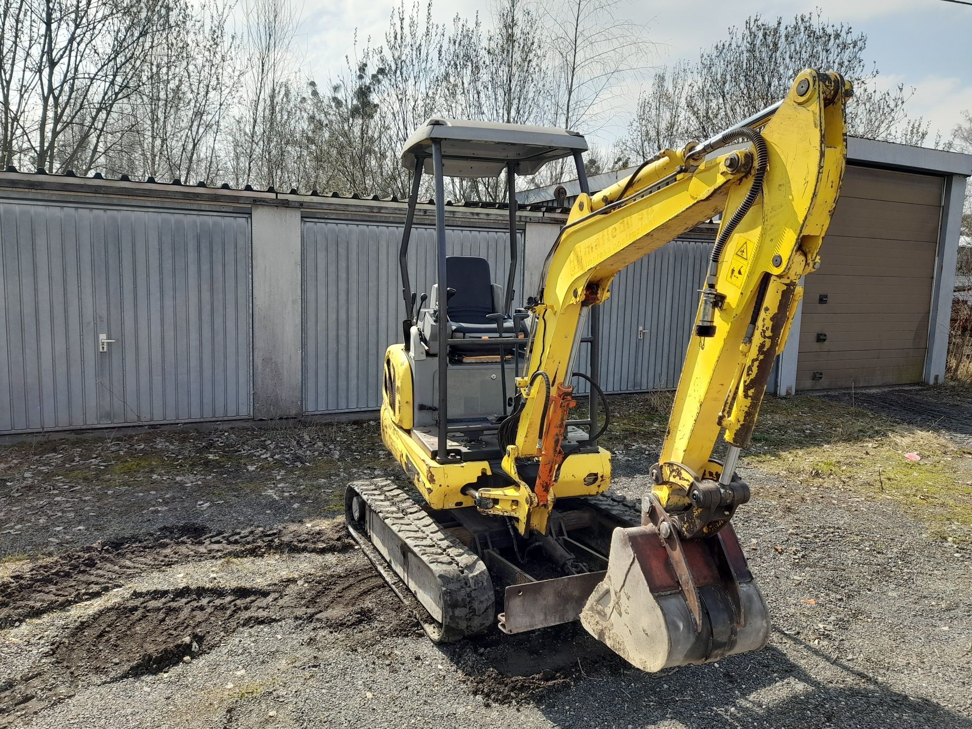 Minikoparka New Holland e18r
