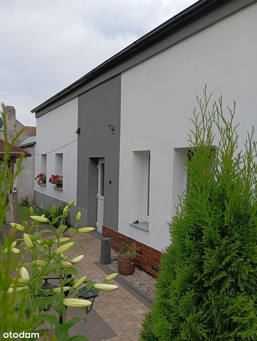 Dom potencjałem inwestycyjnym-180m²z zabudowaniami,2gotowe mieszkania