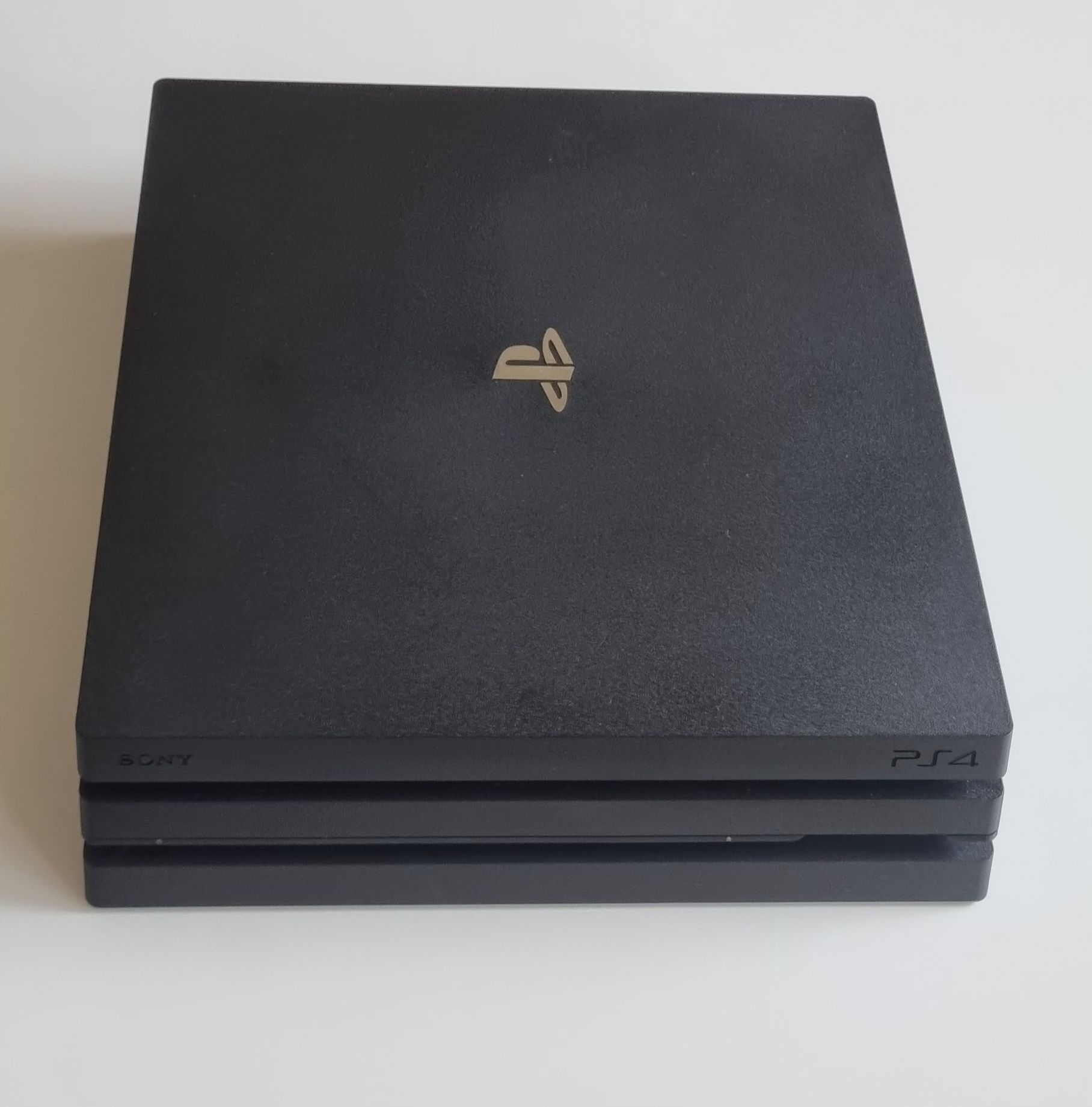 Ps4 Pro + 2 pady + 4 gry