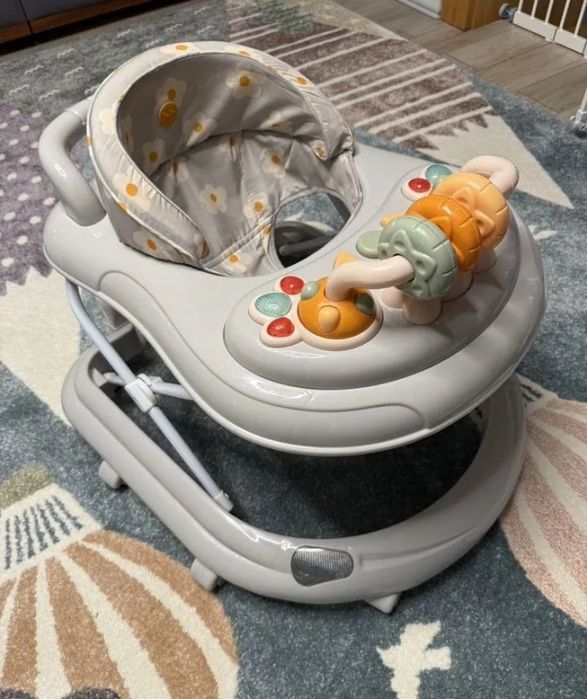 Дитячі ходунки happy baby.