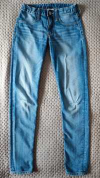 Spodnie jeansy jasne dziury na kolanach skinny H&M r.140 9-10 lat