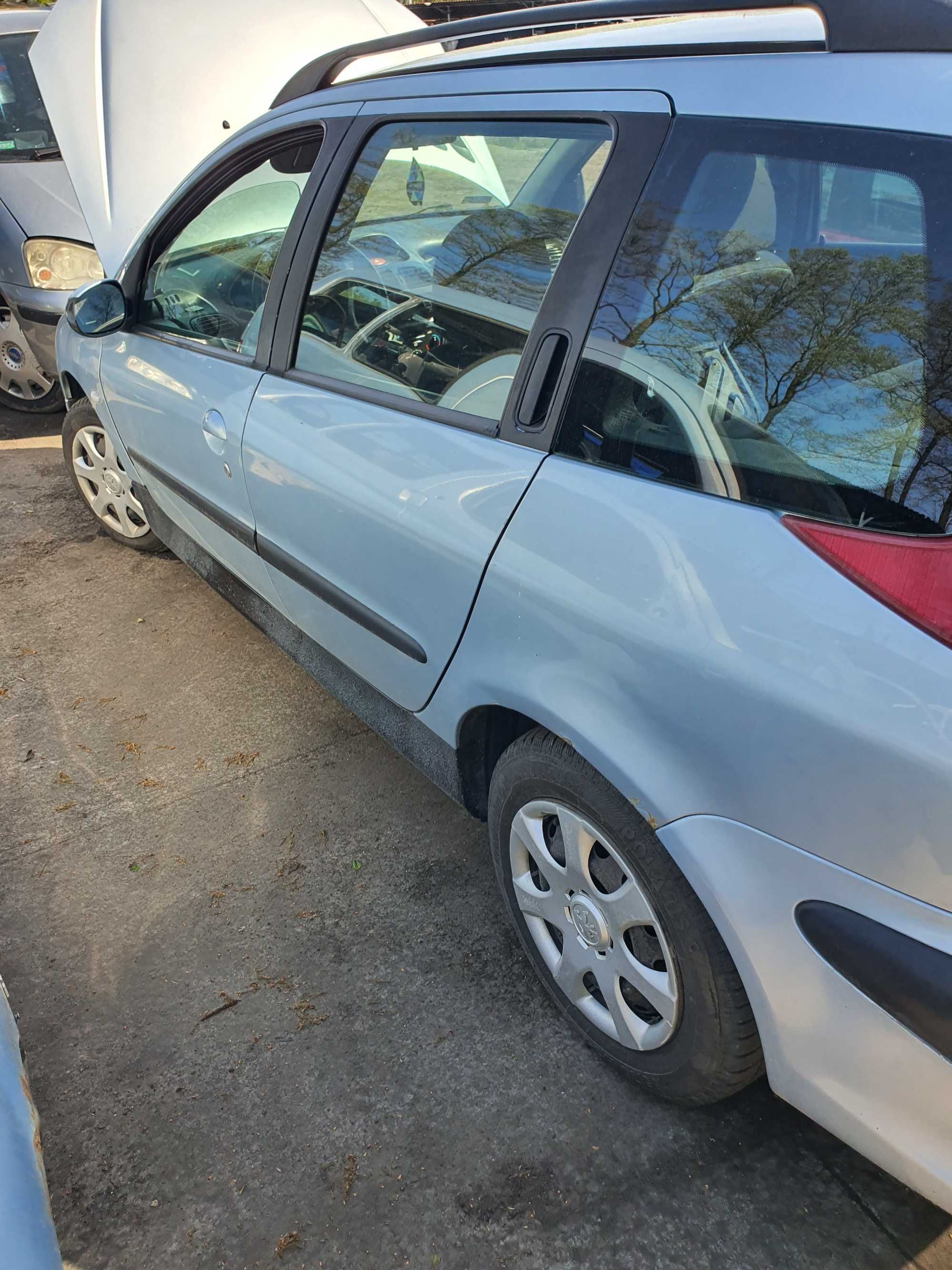 Szyba boczna Peugeot 206 sw kombi