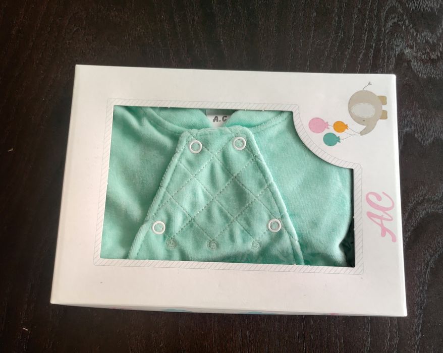 Babygrow de bebé (aperta de lado)