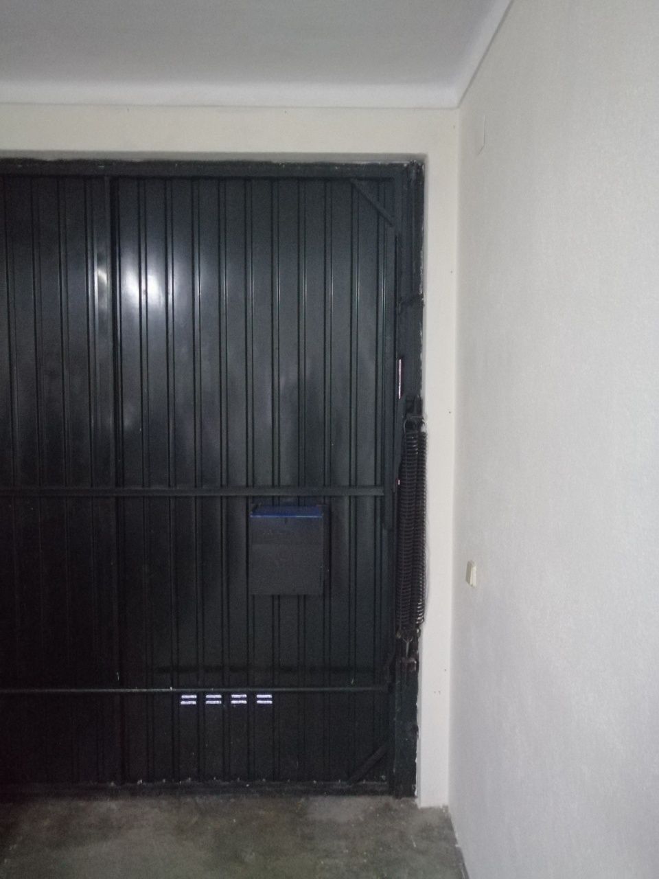 Portão de garagem de molas