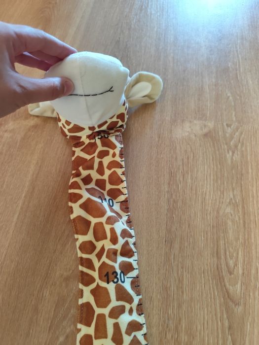 Girafa medidor de altura
