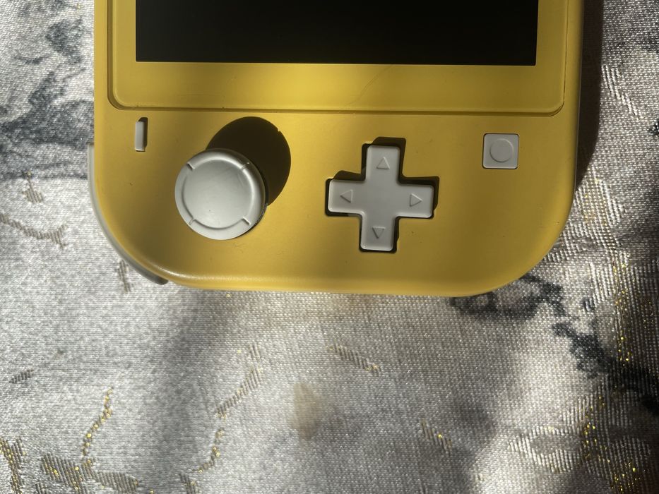 nintendo switch lite żółta+ 9 gier