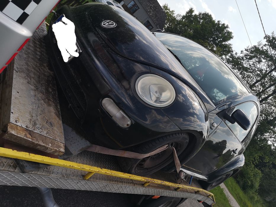 VW New Beetle części od a-z mocowanie okular lampy prawy przód  orygin