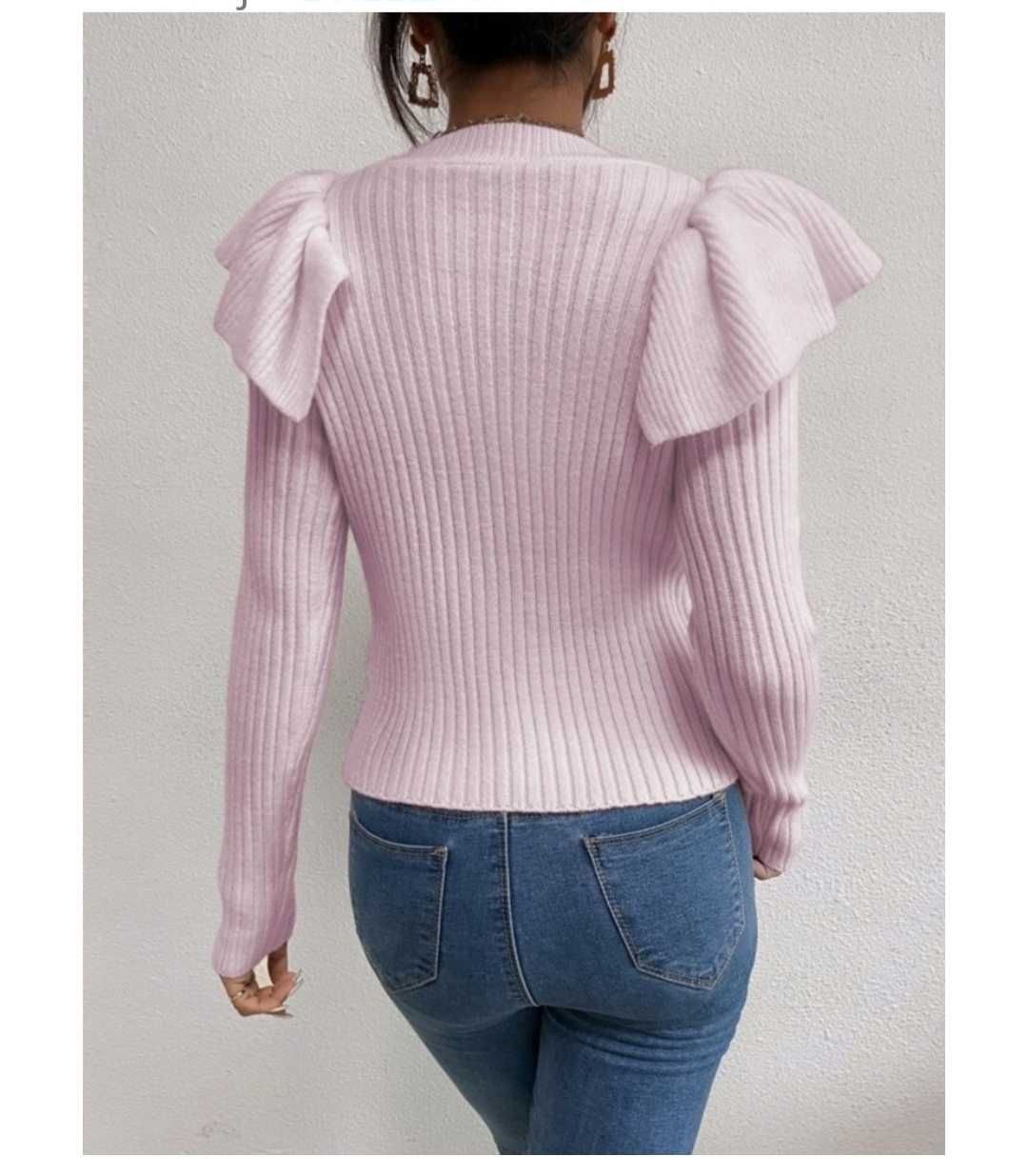 Sweter różowy z falbanami