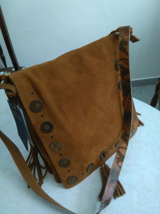 Vendo mala nova em pele por 60€