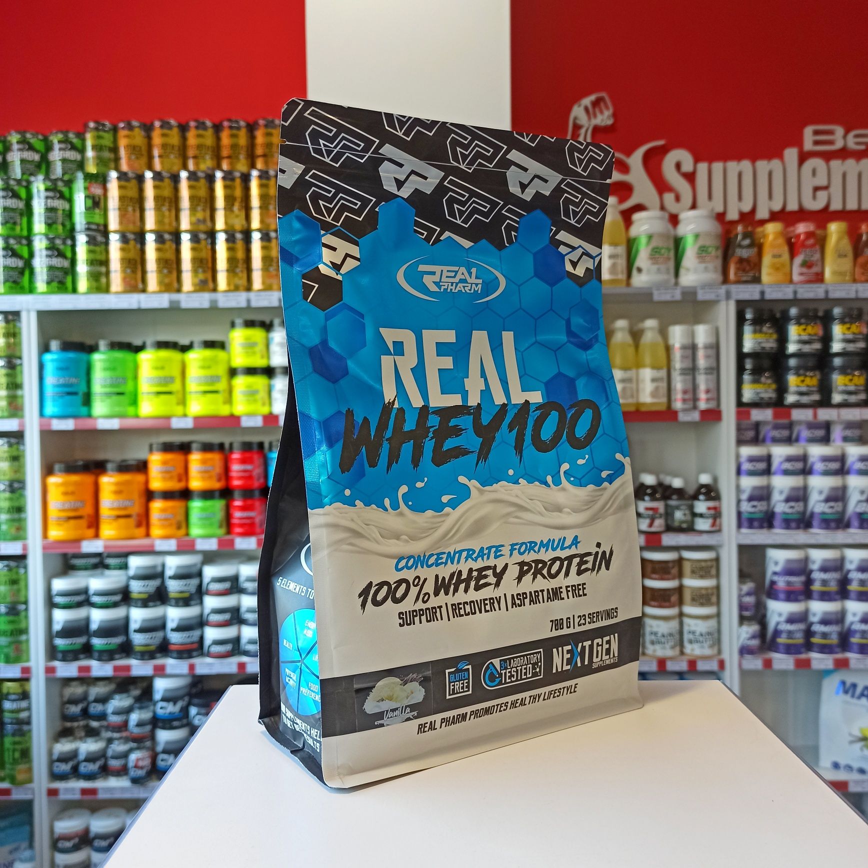 Real Pharm Real Whey 700g Białko WPC Odżywka Białkowa smak waniliowy