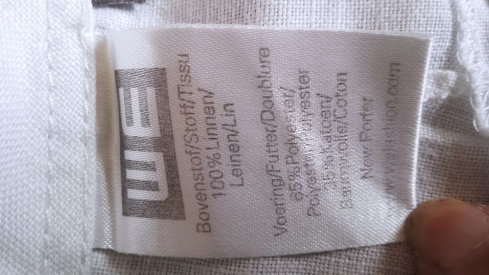 Білі широкі льняні брюки. we