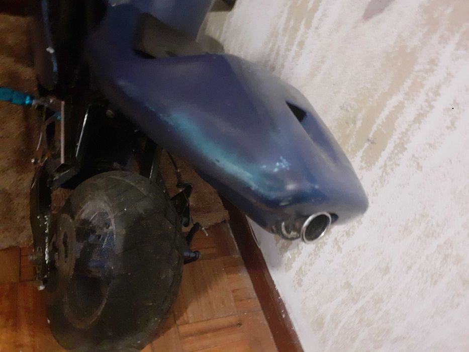 Troco esta mini mota so falta corente esta parada ja a 6 meses