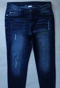 Body Flirt skinny rurki jeansy przetarcia granat spodnie jeansowe L XL