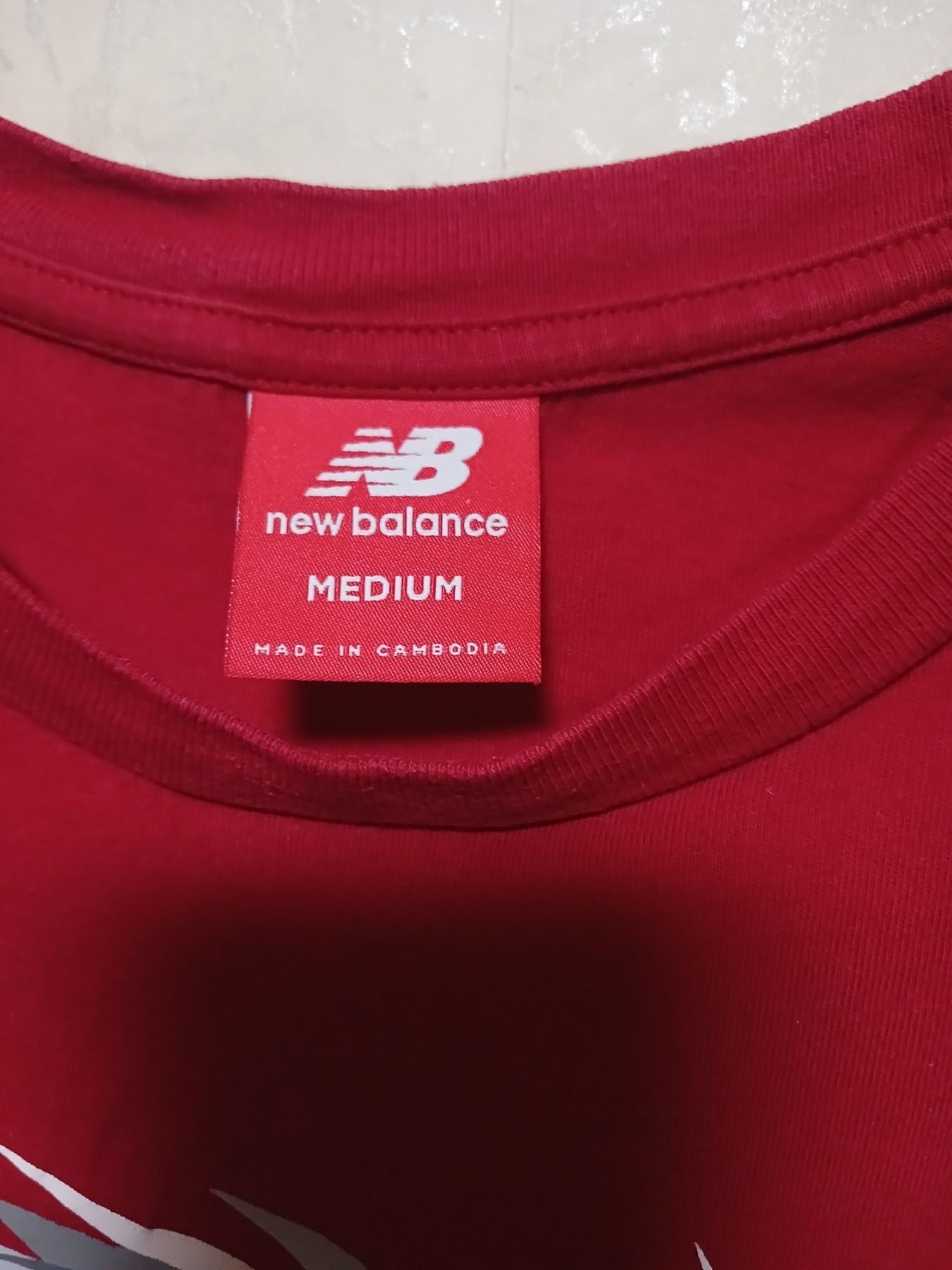 Футболка New Balance .