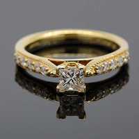 Złoty pierścionek z diamentami 0.75ct 18K zaręczynowy