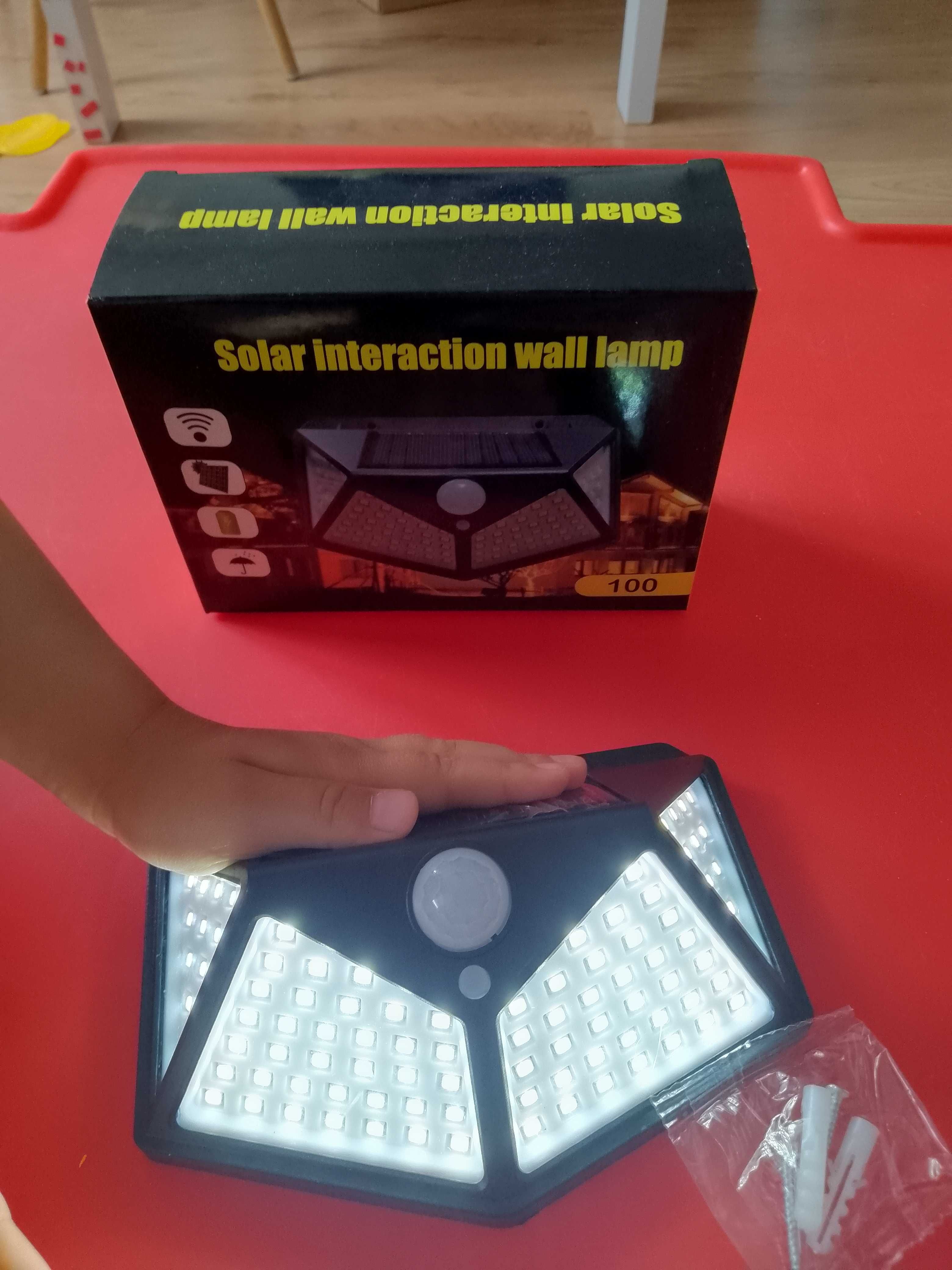 LAMPA SOLARNA 100 LED Z CZUJNIKIEM zmierzchu ruchu elewacyjna ogrodowa