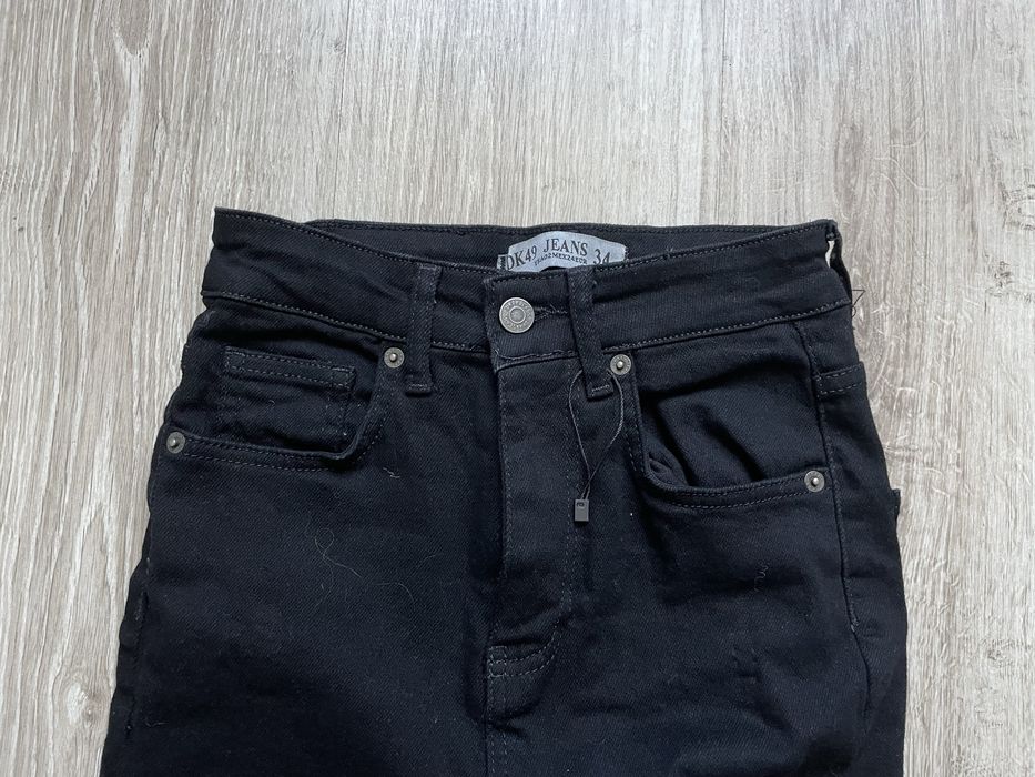 чорні джинси кльош на високій посадці