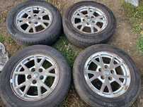 OPEL CHEVROLET KOŁA FELGI ALUMINIOWE 16 OPONY LETNIE 215/60 R16 ET41 6.5J