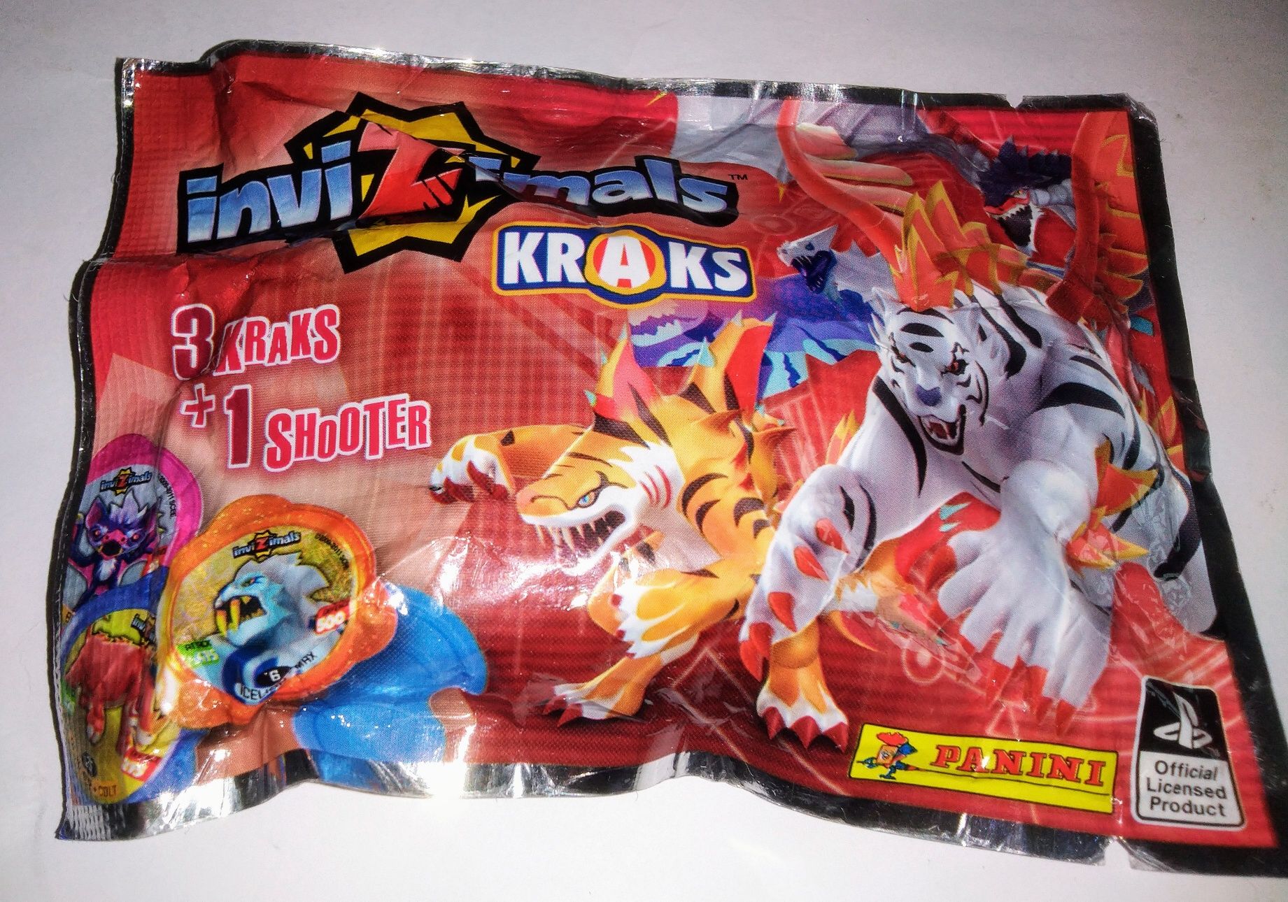 Saqueta fechada de 3 Kraks+1 Shooter Invizimals, Panini.