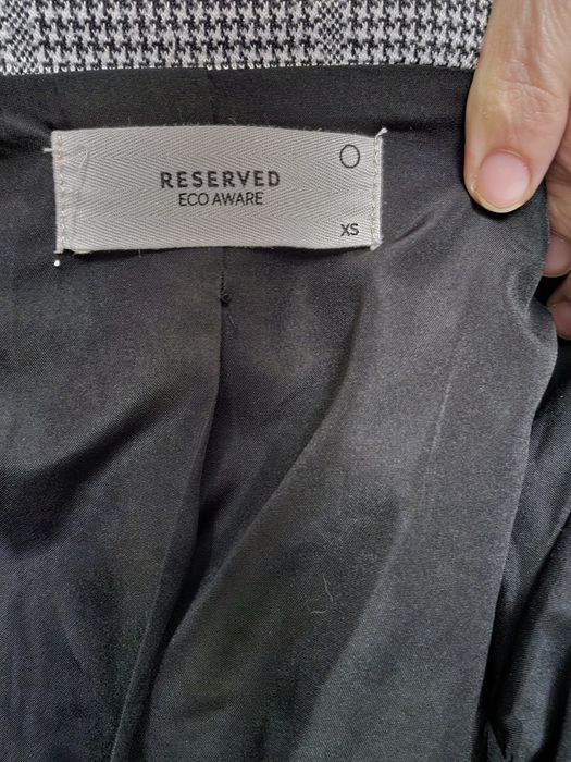 Narzutka zapinana na nap Reserved