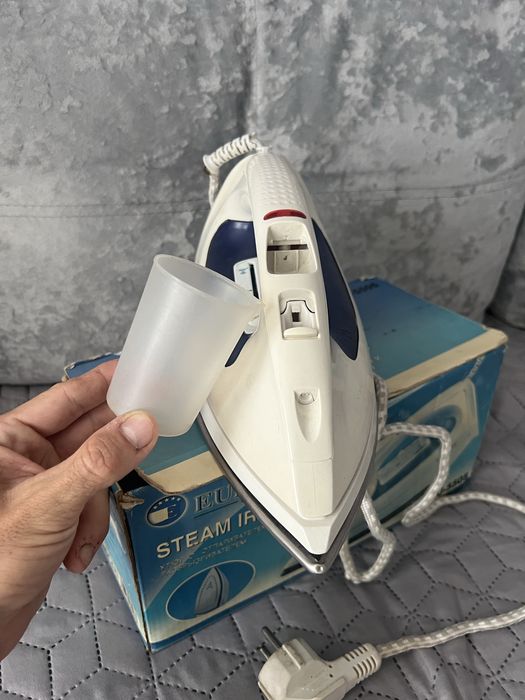 Праска утюг Німеччина