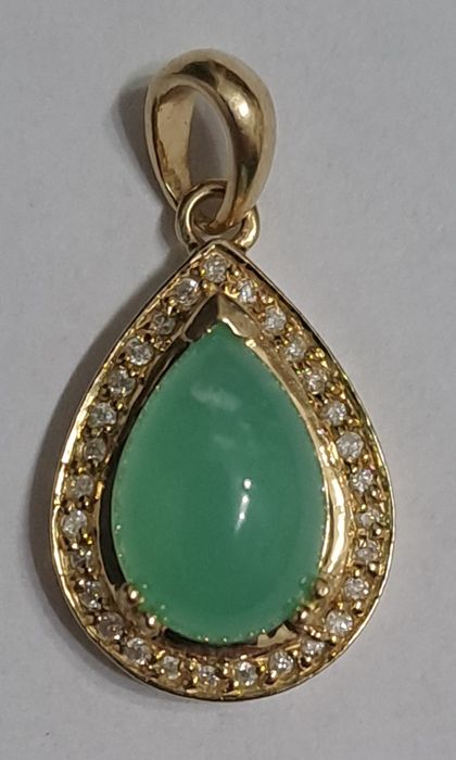 Zawieszka złota zbrylantami.