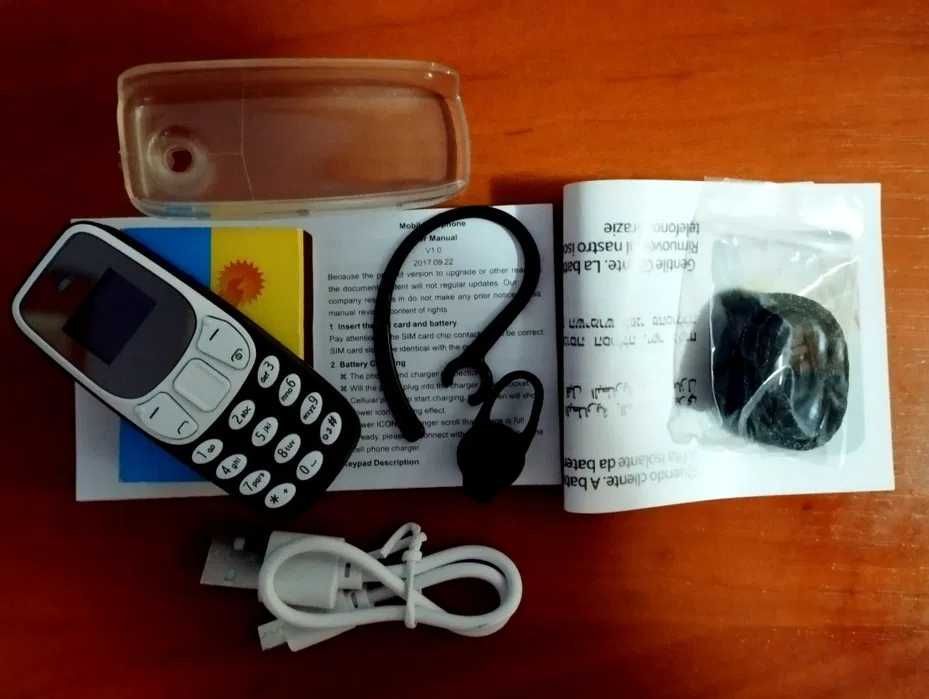 Малюк міні телефон.