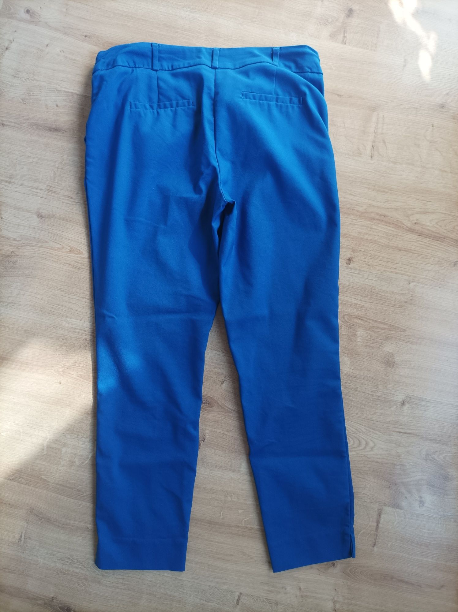 Niebieskie spodnie Reserved 38