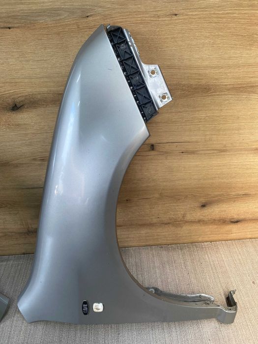 Błotnik przedni lewy, prawy skoda Fabia I kolor 9202