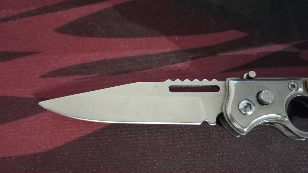 Nóż składany sprężynowy