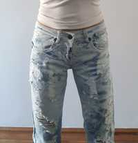 wloskie bajerne i unikatowe jeansy cieniowane z przetarciami rozdarcia