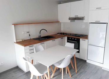 Nowoczesny Apartament w Centrum