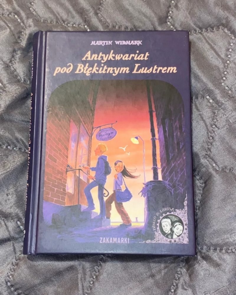 ksiazka "Antykwariat pod blekitnym lustrem"