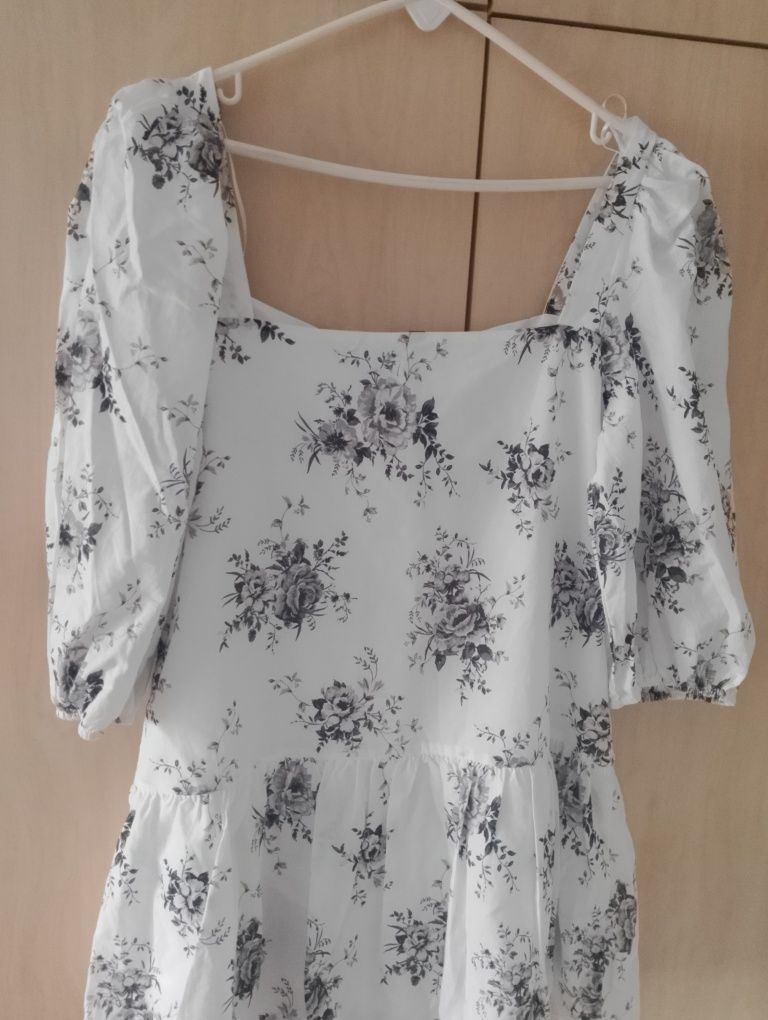 Bardzo ładna damską bluzka,z baskinką nowa H&M