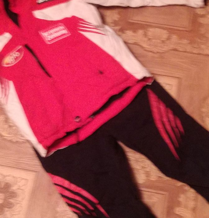 Детские зимние комбинезоны.